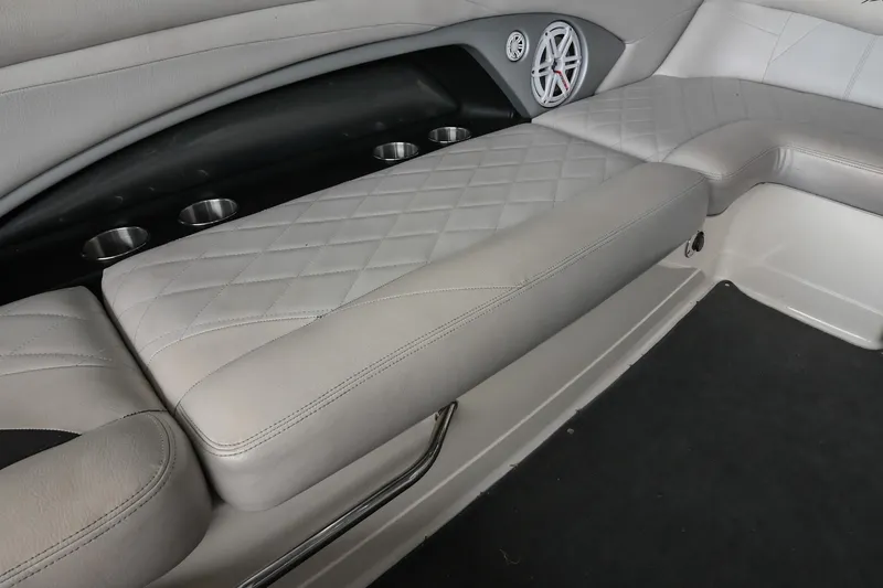 Slide: The Image of 2009 MasterCraft X-45 interior with gray quilted seating and built-in cup holders. - 23