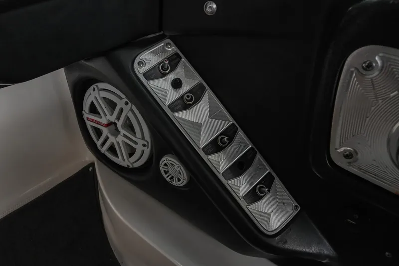 Slide: The Image of 2009 MasterCraft X-45 boat interior with speaker and control panel. - 32