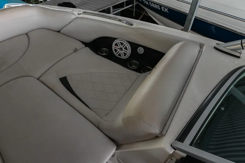 Slide: The Image of 2009 MasterCraft X-45 boat interior with beige upholstery and speaker system. - 38