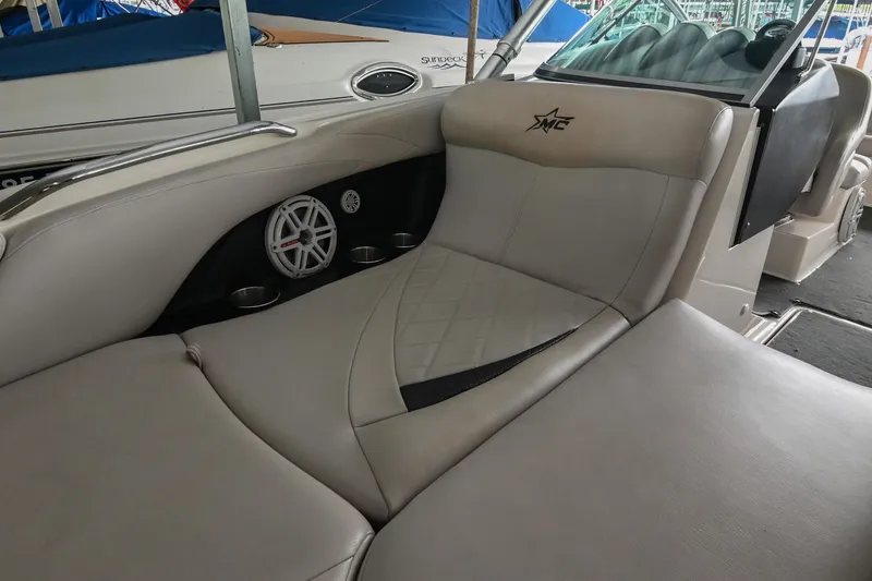 Slide: The Image of 2009 MasterCraft X-45 boat interior with luxurious seating and speaker system. - 39