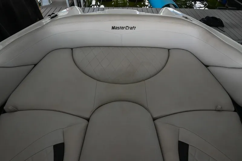 Slide: The Image of 2009 MasterCraft X-45 boat interior with cushioned seating. - 40
