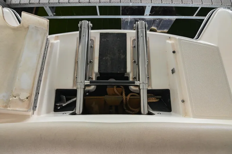 Slide: The Image of 2009 MasterCraft X-45 boat swim platform with ladder and storage compartment. - 41