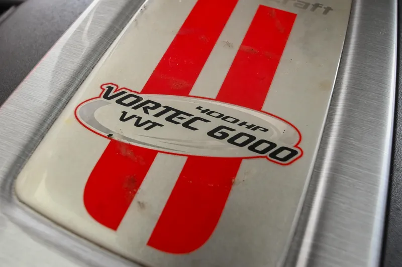 Slide: The Image of 2009 MasterCraft X-45 engine badge, Vortec 6000, 400 HP, red stripes. - 43