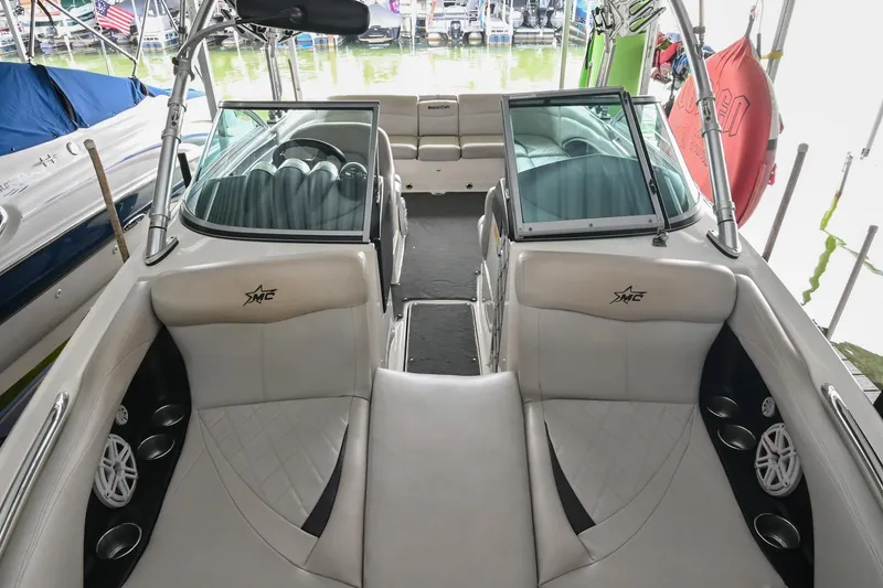 Slide: The Image of 2009 MasterCraft X-45 boat interior with plush seating and sleek design. - 9