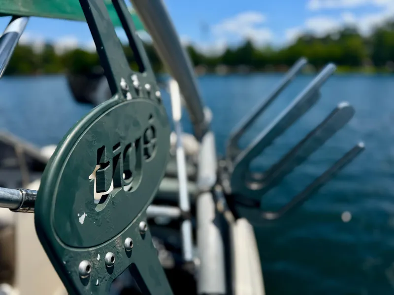 Slide: The Image of Close-up of 2005 Tigé 24V boat detail with water in the background. - 5