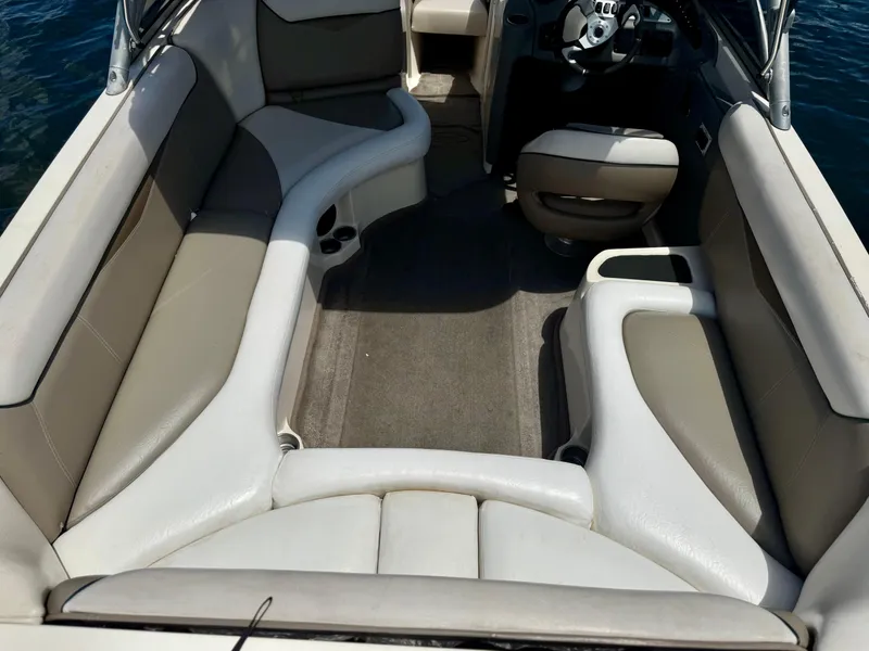 Slide: The Image of 2005 Tigé 24V boat interior with spacious seating and modern design. - 8