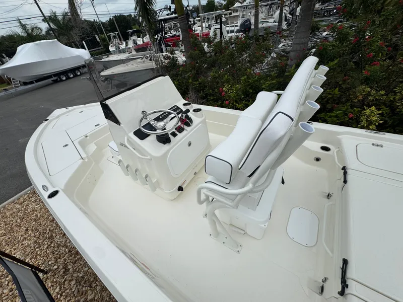 Slide: The Image of 2025 Skeeter SX 221 boat with white interior and dual seating. - 21