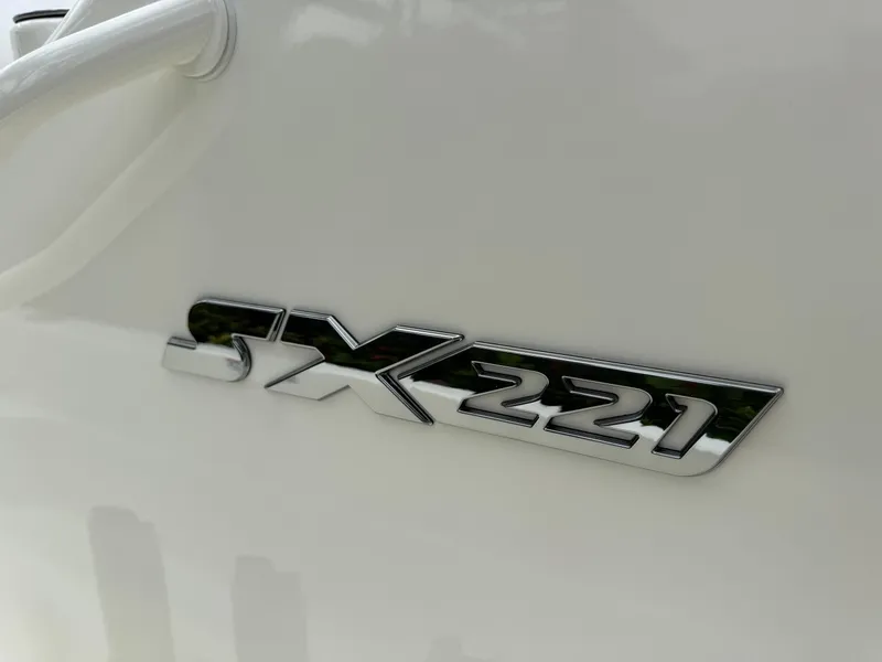 Slide: The Image of 2025 Skeeter SX 221 boat emblem on a white surface. - 35