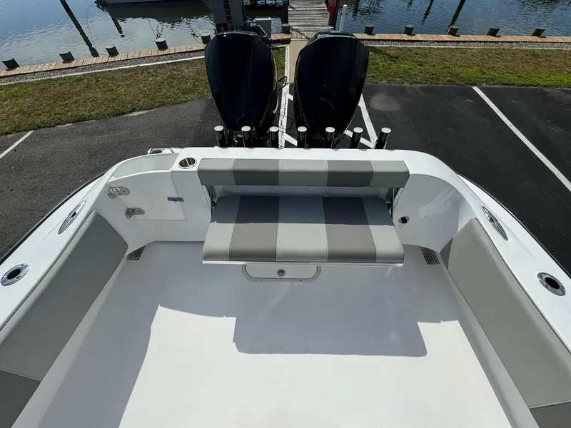 Slide: The Image of 2025 Cape Horn 27 XS boat with dual engines and spacious seating area. - 10