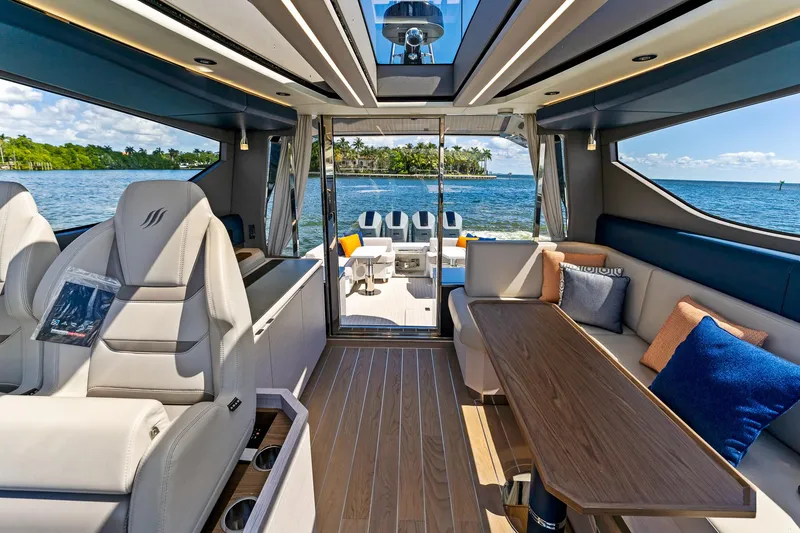 Slide: The Image of Luxurious interior of 2024 Uniesse Exuma HTC5p yacht with ocean view. - 16