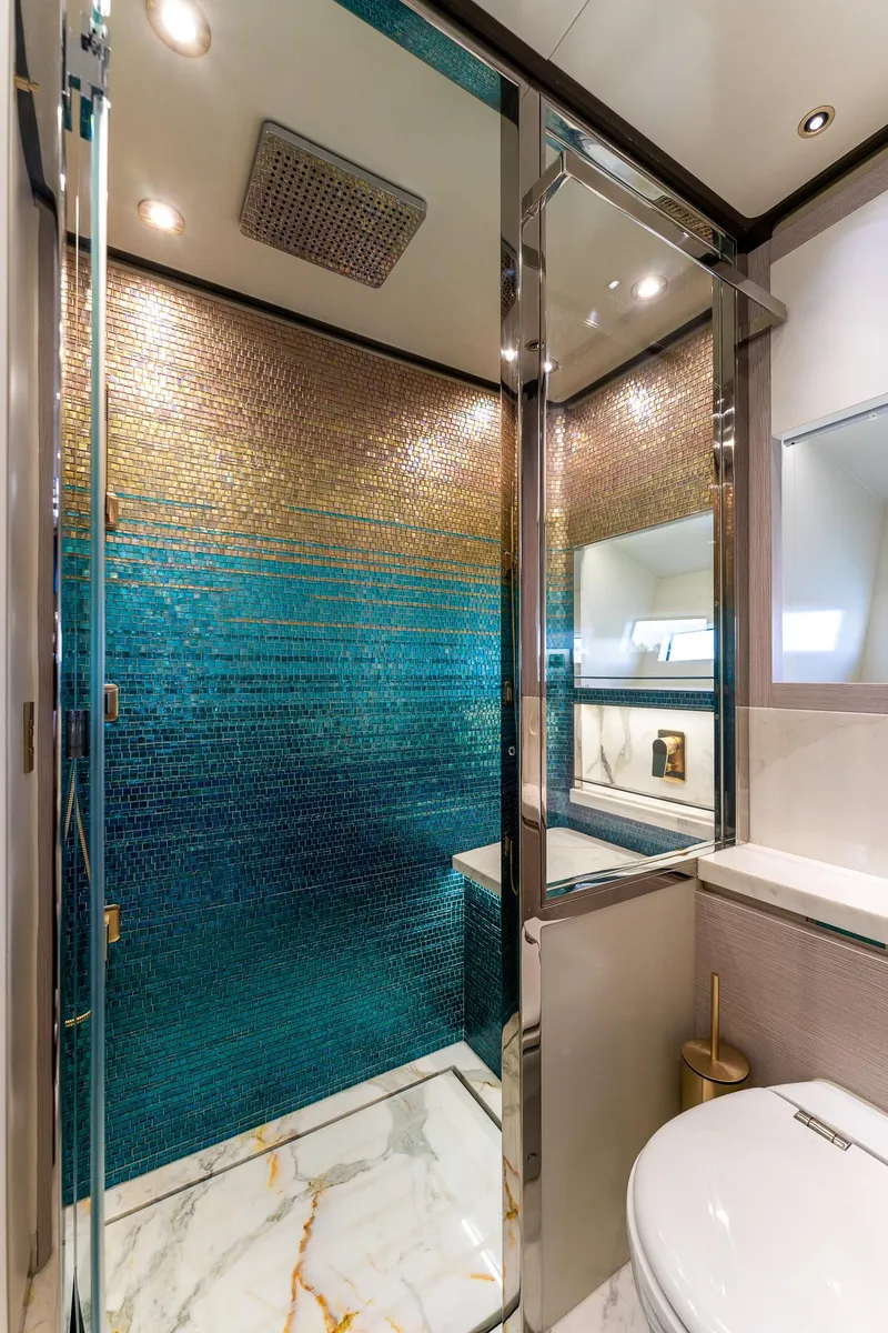 Slide: The Image of Luxurious bathroom in 2024 Uniesse Exuma HTC5p yacht with elegant mosaic tiles and modern fixtures. - 31