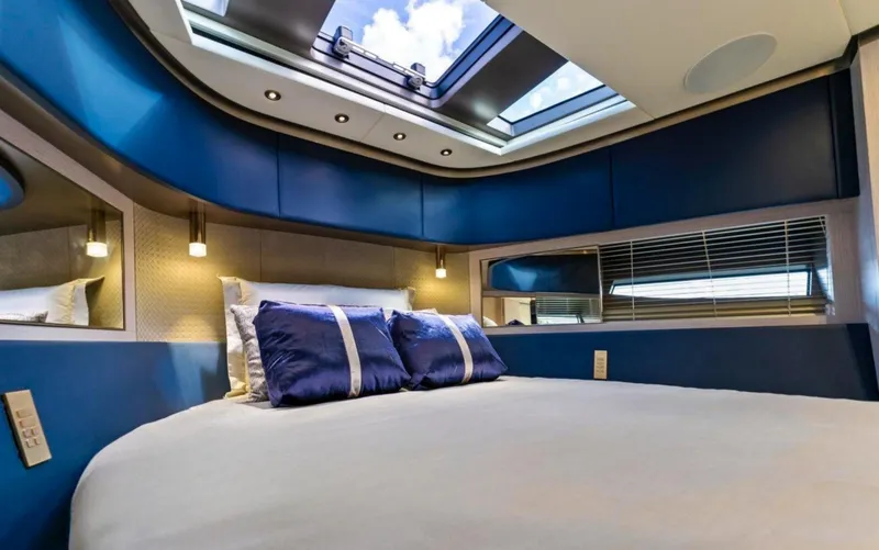 Slide: The Image of Luxurious bedroom interior of 2024 Uniesse Exuma HTC5p yacht with skylight and modern design. - 32
