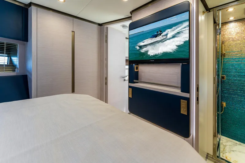 Slide: The Image of Luxurious interior of 2024 Uniesse Exuma HTC5p yacht with modern design and elegant finishes. - 33