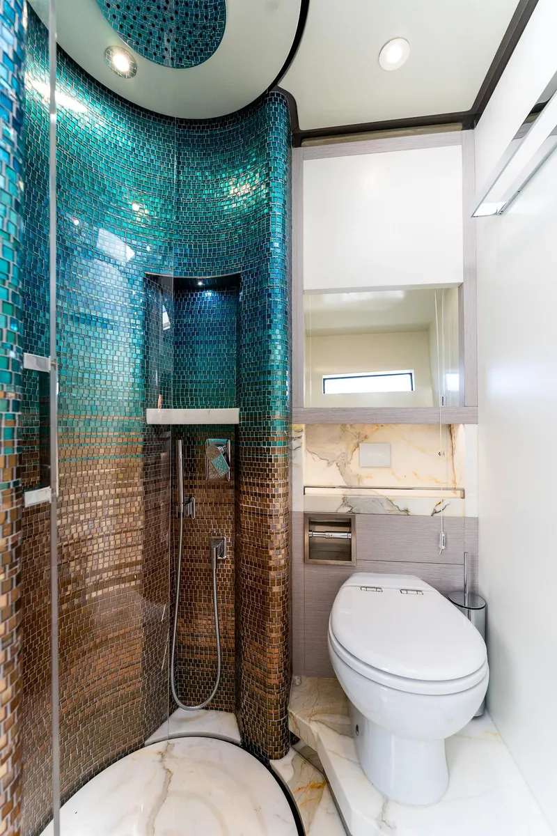 Slide: The Image of Luxurious bathroom in 2024 Uniesse Exuma HTC5p yacht with mosaic shower. - 34