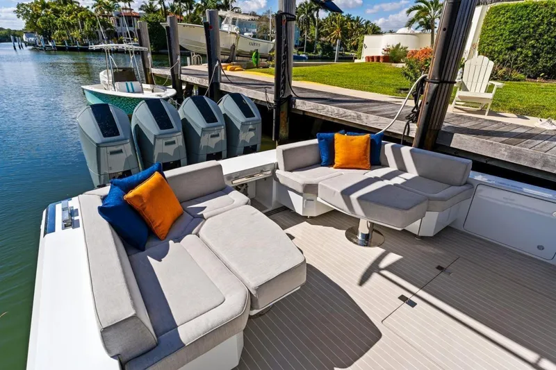 Slide: The Image of Luxurious 2024 Uniesse Exuma HTC5p yacht deck with plush seating and vibrant cushions. - 40