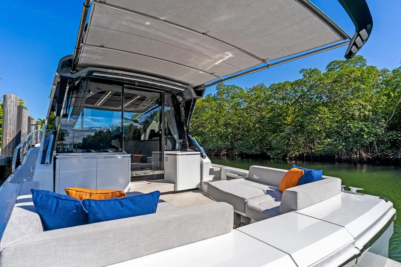 Slide: The Image of 2024 Uniesse Exuma HTC5p luxury yacht with spacious outdoor seating and modern design. - 41