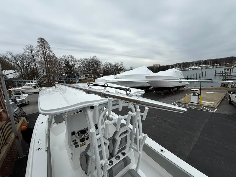 Slide: The Image of 2025 Cape Horn 28 XS boat docked, showcasing sleek design and advanced features. - 10