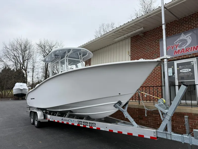 Slide: The Image of 2025 Cape Horn 28 XS boat on trailer outside PYY Marine building. - 25