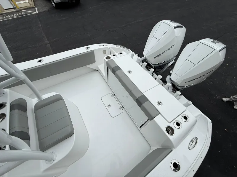 Slide: The Image of 2025 Cape Horn 28 XS boat with dual Mercury outboard engines, featuring spacious seating and sleek design. - 9