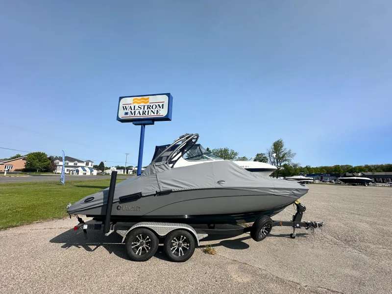 Slide: The Image of 2022 Yamaha Boats 212SD on trailer at Walstrom Marine dealership. - 2