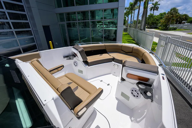 Slide: The Image of 2026 Monterey Elite 27 OB boat with luxurious seating and modern design. - 14