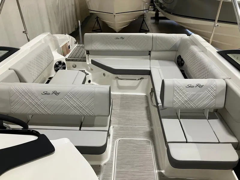 Slide: The Image of 2025 Sea Ray SDX 250 boat interior with luxurious seating and modern design. - 10