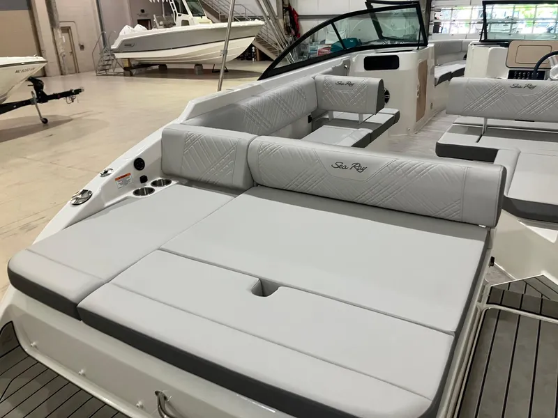 Slide: The Image of 2025 Sea Ray SDX 250 boat interior with spacious seating and modern design. - 4