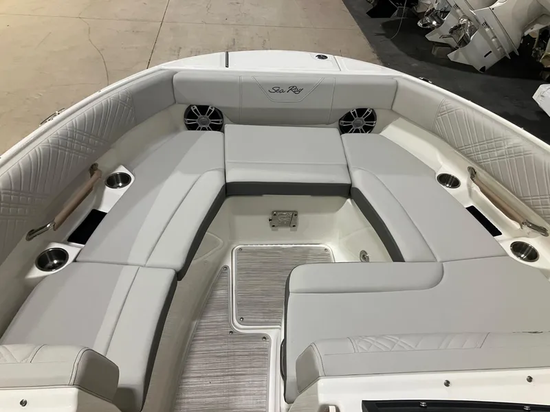 Slide: The Image of 2025 Sea Ray SDX 250 boat interior with spacious seating and modern design. - 9