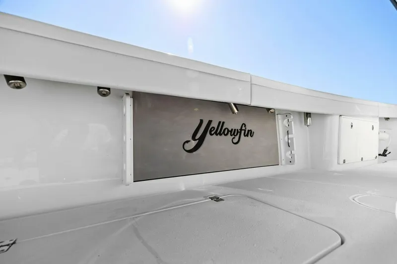 Slide: The Image of 2021 Yellowfin 39 boat interior with logo, showcasing sleek design and craftsmanship. - 36