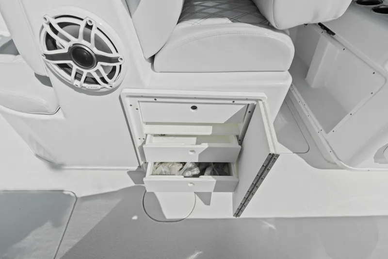 Slide: The Image of 2021 Yellowfin 39 boat interior with storage drawers and speaker. - 8