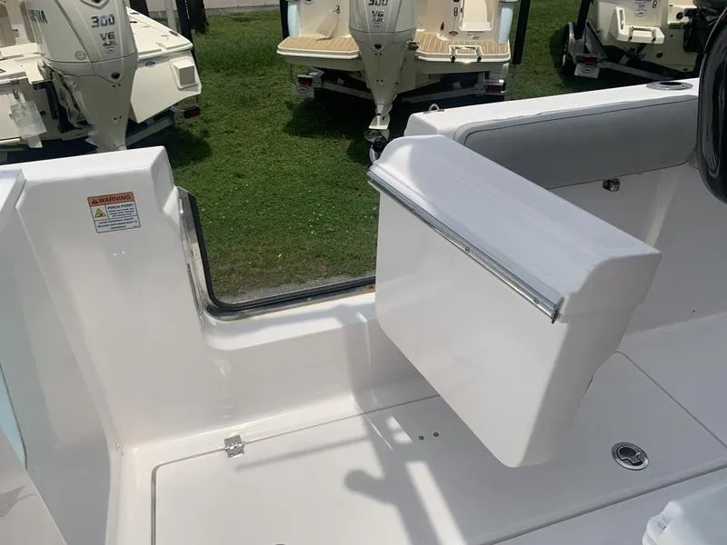 Slide: The Image of 2023 Sea Fox 268 Commander boat interior with seating and storage features. - 12