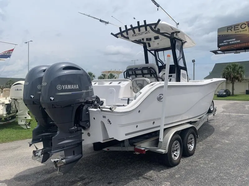Slide: The Image of 2023 Sea Fox 268 Commander boat with dual Yamaha engines on a trailer. - 4
