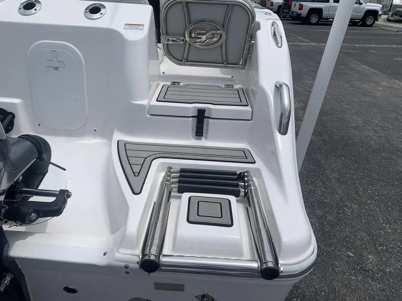 Slide: The Image of 2023 Sea Fox 268 Commander boat deck with ladder and seating area. - 9