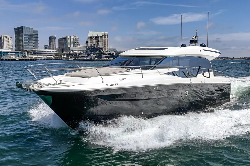 The Image of 2019 Prestige 520S yacht cruising in urban waterfront setting. - 0
