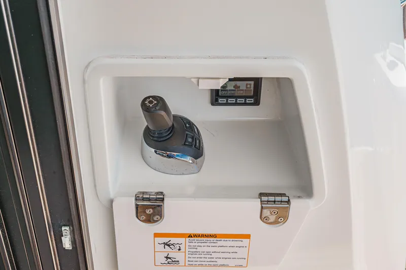 Slide: The Image of Control panel of a 2019 Prestige 520S yacht with joystick and display. - 18