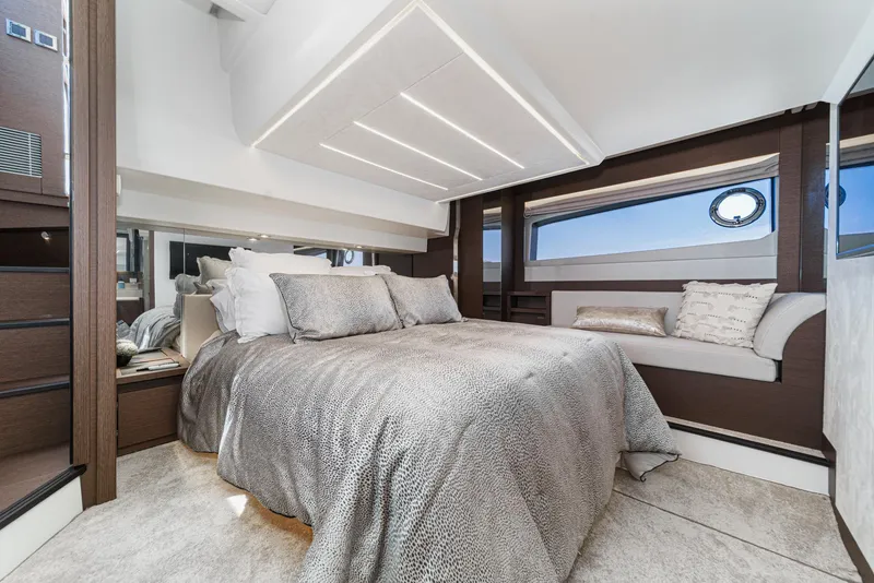 Slide: The Image of Luxurious bedroom interior of 2019 Prestige 520S yacht with modern design and elegant bedding. - 37