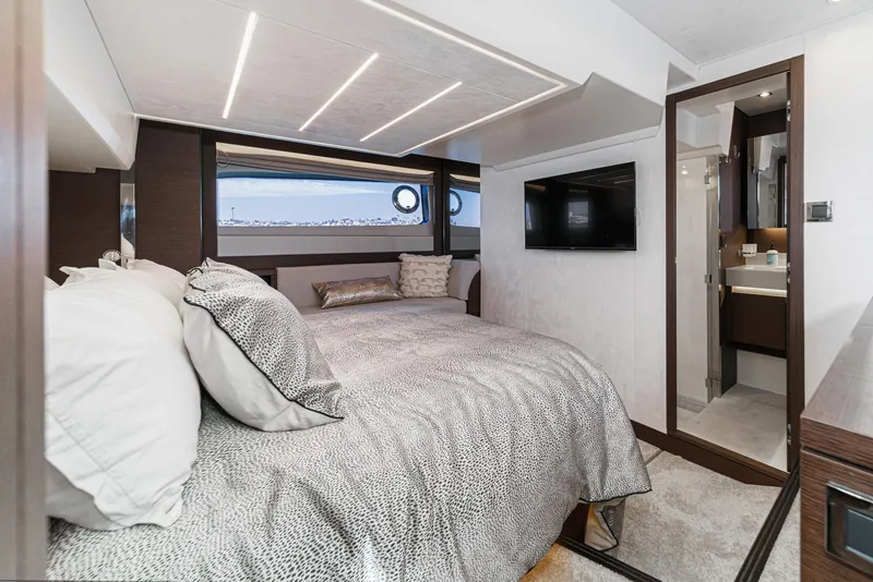 Slide: The Image of Luxurious bedroom interior of 2019 Prestige 520S yacht with modern design and ocean view. - 39