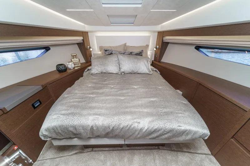 Slide: The Image of Luxurious bedroom interior of 2019 Prestige 520S yacht with elegant bedding and modern design. - 42