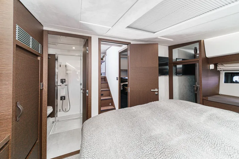 Slide: The Image of Luxurious interior of 2019 Prestige 520S yacht featuring bedroom and modern bathroom. - 44