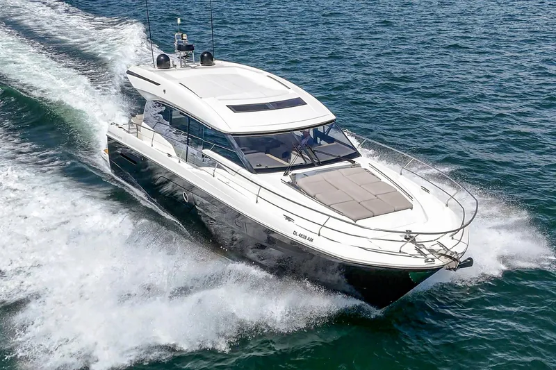 Slide: The Image of 2019 Prestige 520S yacht cruising on open water, showcasing sleek design and luxury features. - 7