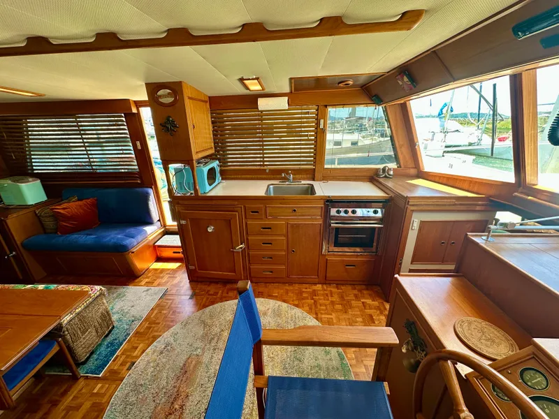 Slide: The Image of Interior of a 1994 Grand Banks 42 Classic yacht with wooden cabinetry and nautical decor. - 21