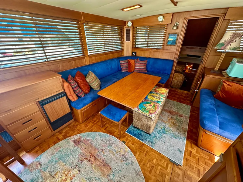 Slide: The Image of Interior of 1994 Grand Banks 42 Classic yacht with cozy seating and wooden accents. - 22