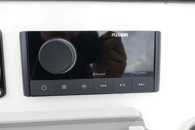 Slide: The Image of Fusion Bluetooth audio system on 2025 Sea Fox 248 Commander boat dashboard. - 14