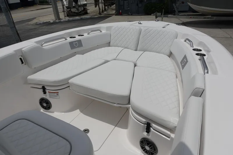 Slide: The Image of Luxurious seating area on 2025 Sea Fox 248 Commander boat with white cushioned upholstery. - 18