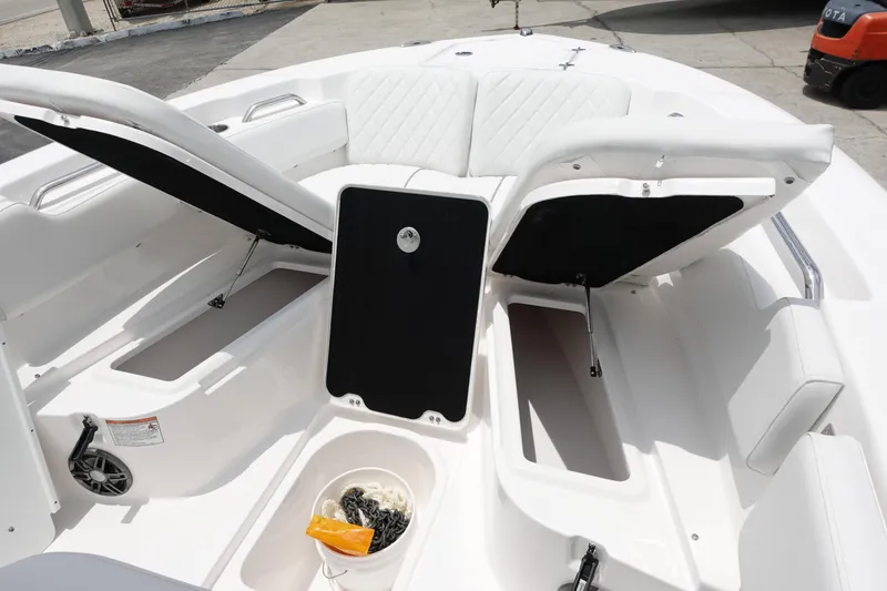 Slide: The Image of 2025 Sea Fox 248 Commander boat interior with open storage compartments and seating. - 20