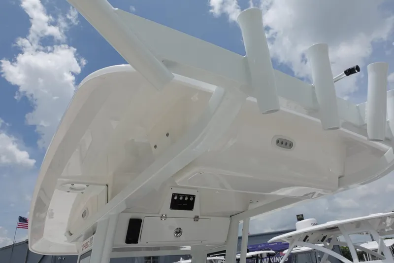 Slide: The Image of 2025 Sea Fox 248 Commander boat's T-top under view against a cloudy sky. - 28