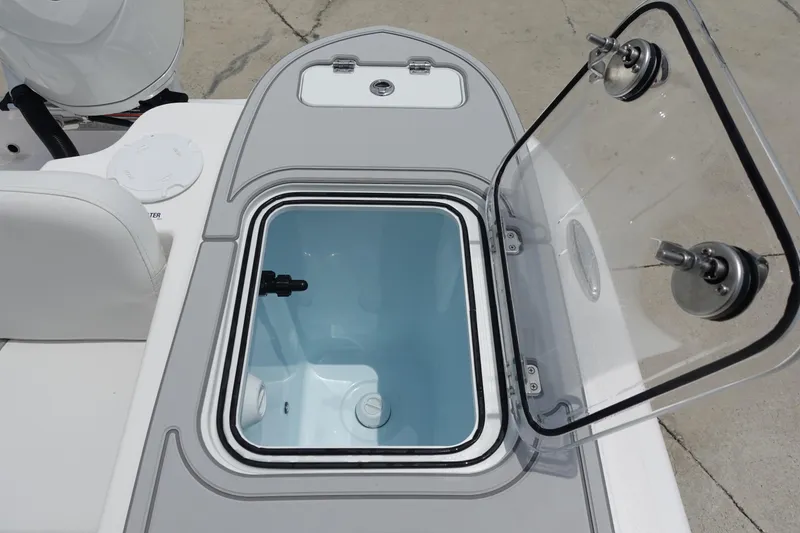Slide: The Image of Open storage compartment on 2025 Sea Fox 248 Commander boat. - 8