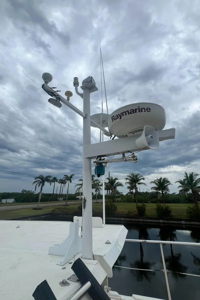 Slide: The Image of Radar equipment on a 2006 Great Harbour N37 boat under cloudy skies. - 5
