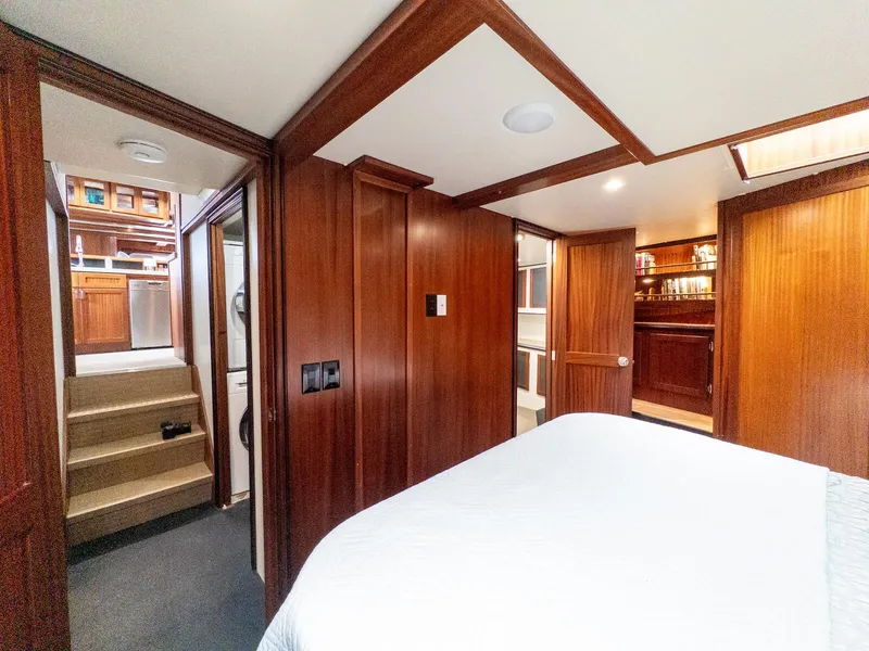 Slide: The Image of Luxurious interior of 1986 Custom Expedition Vessel 58 with wood paneling and modern amenities. - 18