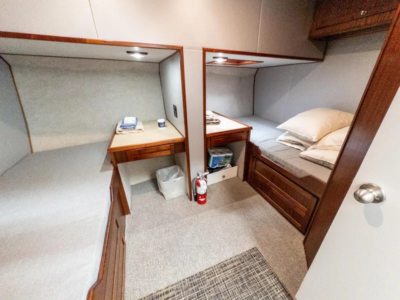 Slide: The Image of Two cozy bunk beds in a 1986 Custom Expedition Vessel 58 cabin. - 25